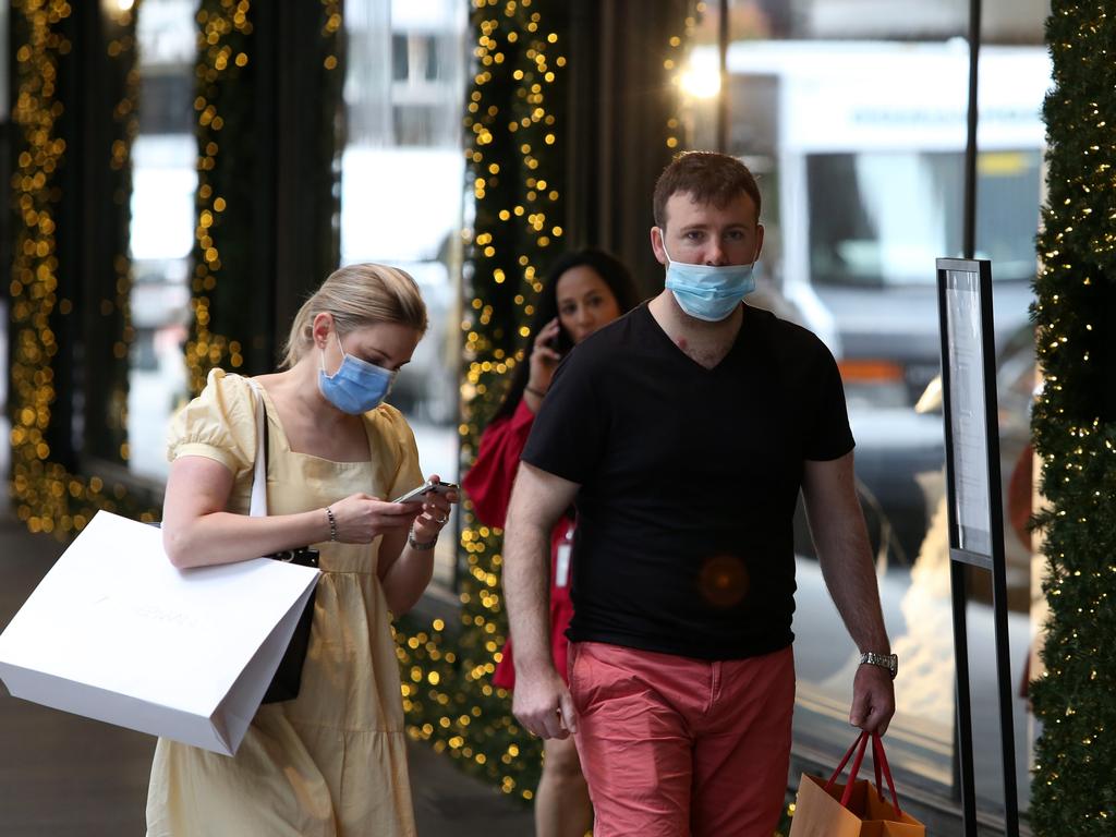 Masks are back in indoor settings for some states, including Sydney, due to surging Omicron cases. Picture: Getty Images