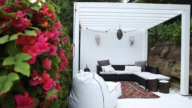 Outdoor entertaining terrace with fire-pit. Alexandra Smart, one half of designer fashion label Ginger + Smart, at her home in Neutral Bay on Sydney's lower North Shore. Britta Campion / The Australian