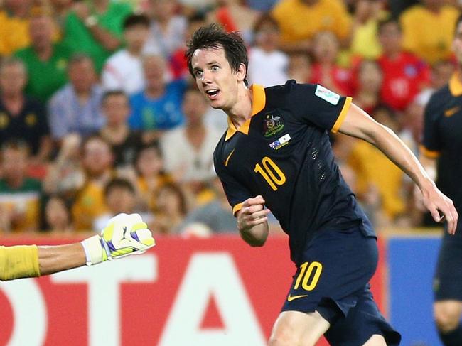 BRISBANE, AUSTRALIA - JANUARY 17: Robbie Kruse of the Socceroos takes a shot at goal during the 2015 Asian Cup match between Australia and Korea Republic at Suncorp Stadium on January 17, 2015 in Brisbane, Australia. (Photo by Cameron Spencer/Getty Images)