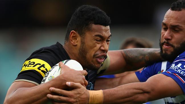 Waqa Blake of the Panthers is tackled.