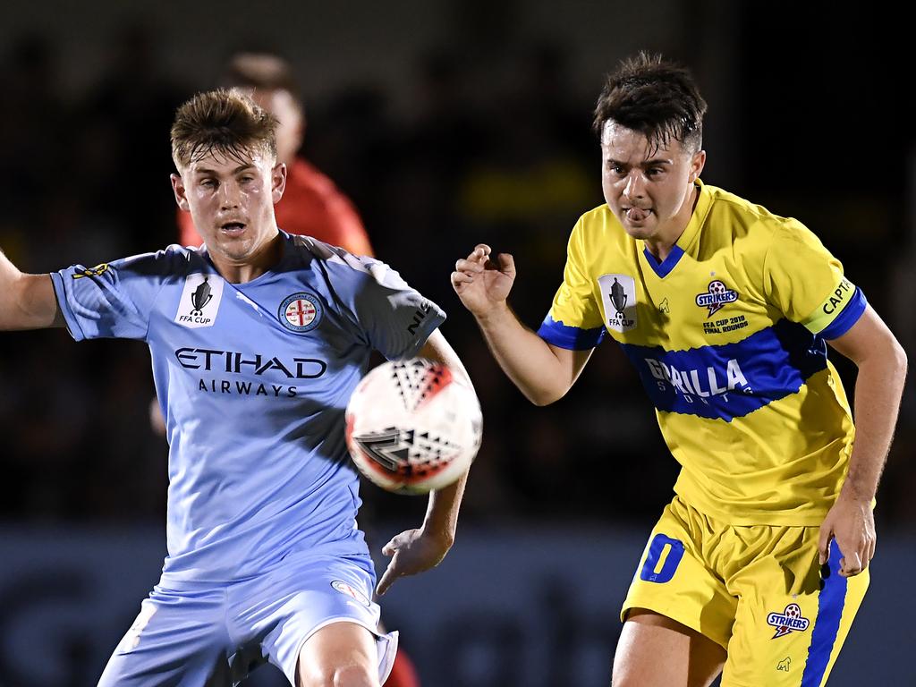 Jake McLean (right) has signed with the Brisbane Strikers. Picture: Albert Perez/Getty Images