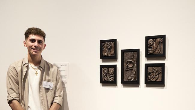 George Alkhoury, Bossley Park High School, with his work 'Clamorous incognito of the unconscious mind'. Picture: Mim Stirling