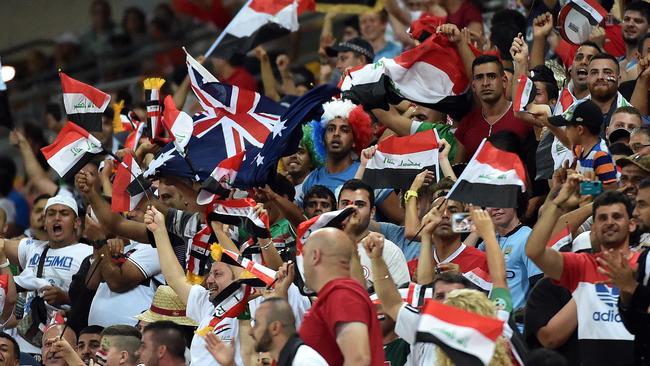 Iraq fans celebrate a goal — peacefully.