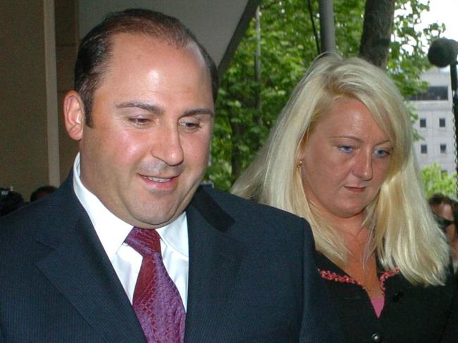 Tony Mokbel (left) with his legal team Nicola Gobbo (behind, centre) and Con Heliotis QC (right) outside Magistrates court.