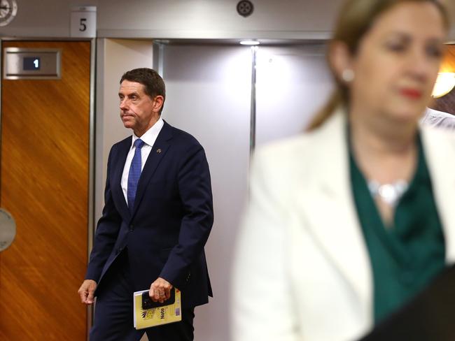 Cameron Dick passes behind Queensland Premier Annastacia Palaszczuk as he arrives for a Caucus meeting in Brisbane last month. Picture: David Clark