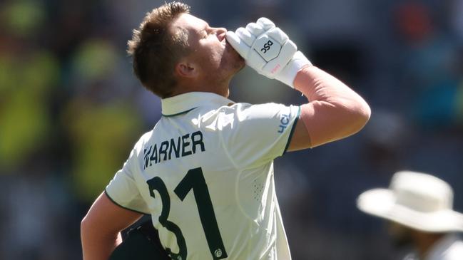 David Warner of Australia celebrates after scoring a century during day one of the Men's First Test match between Australia and Pakistan. (Photo by Paul Kane/Getty Images)