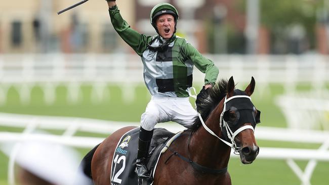 Glen Boss riding Yes Yes Yes celebrates as he returns to scale after winning The Everest in 2019. Picture: Mark Metcalfe/Getty Images