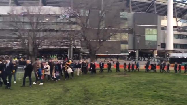  Fans queue at MCG for finals blockbuster