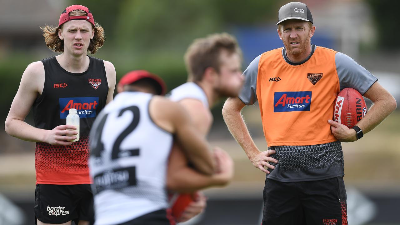 The two Fletchers watch the Dons go at it. Picture: Getty Images