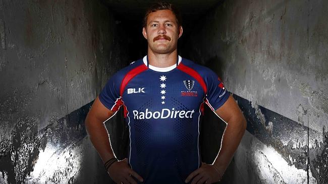 New Melbourne Rebels captain Scott Higginbotham models the club's new guernsey. Picture: Mi...