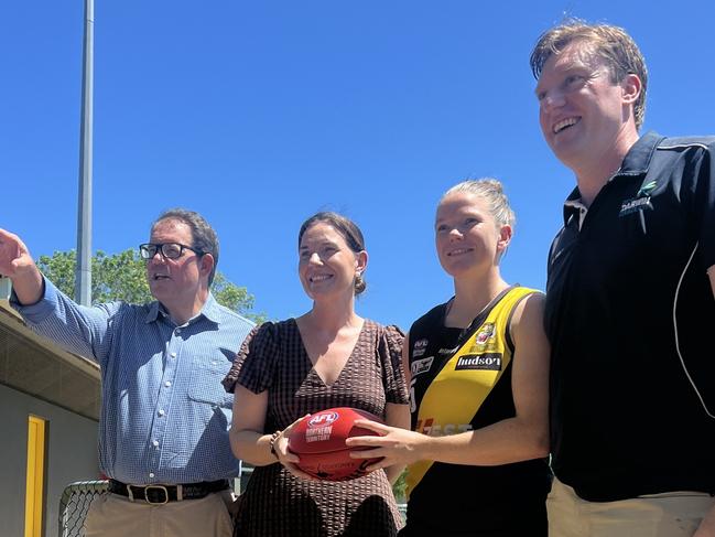 Solomon MP Luke Gosling, AFL NT Facilities and Government Partnerships Manager NT Katrina Kawaljenko, Nightcliff Tigers player Hayley Jones and Councillor Ed Smelt at Nightcliff Oval.