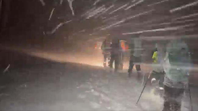 Search teams hike through snow to rescue two stranded bushwalkers in the Kosciuszko National Park. Picture: Supplied