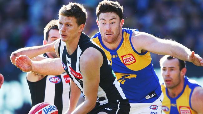 Jeremy McGovern closes down Will Hoskin-Elliott. Picture: Getty Images