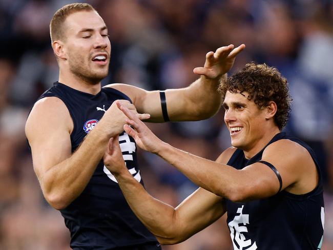 MELBOURNE, AUSTRALIA - MARCH 23: Harry McKay (left) and Charlie Curnow of the Blues celebrate during the 2023 AFL Round 02 match between the Carlton Blues and the Geelong Cats at the Melbourne Cricket Ground on March 23, 2023 in Melbourne, Australia. (Photo by Michael Willson/AFL Photos via Getty Images)