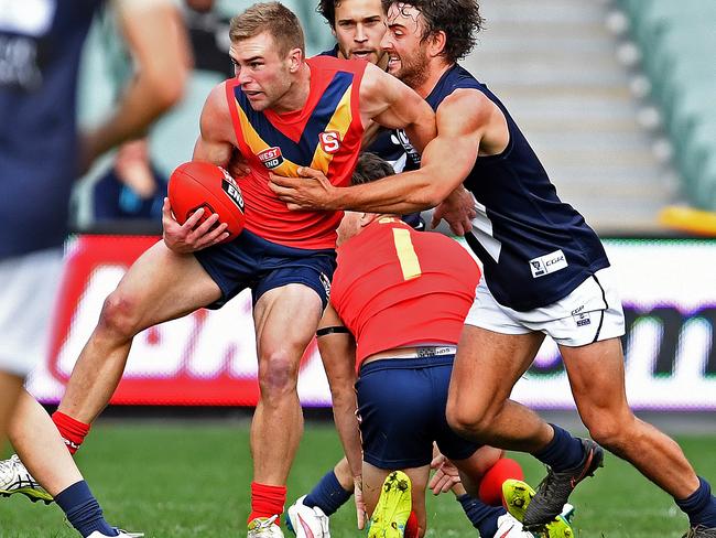 29/05/16 State game betwen SANFL and VFL at Adelaide Oval.  South Australia's Andrew Bradley takes on Victoria's Willie Wheeler. Photo Tom Huntley