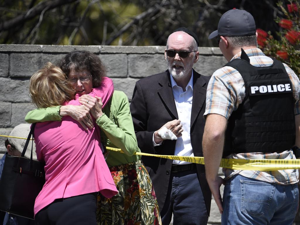 Two people hug outside the Chabad of Poway Synagogue in San Diego. Picture: AP 