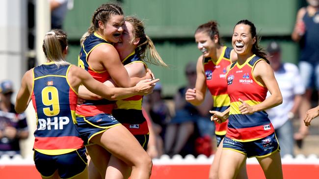 Anne Hatchard of the Adelaide Crows (second from left) celebrates a goal with her teammates during the Round 3 AFLW match against Geelong. Picture: AAP Image/Sam Wundke