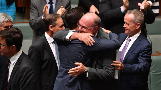 Liberal MPs Trevor Evans and Warren Entsch celebrate the passing of the Marriage Amendment Bill in 2017.