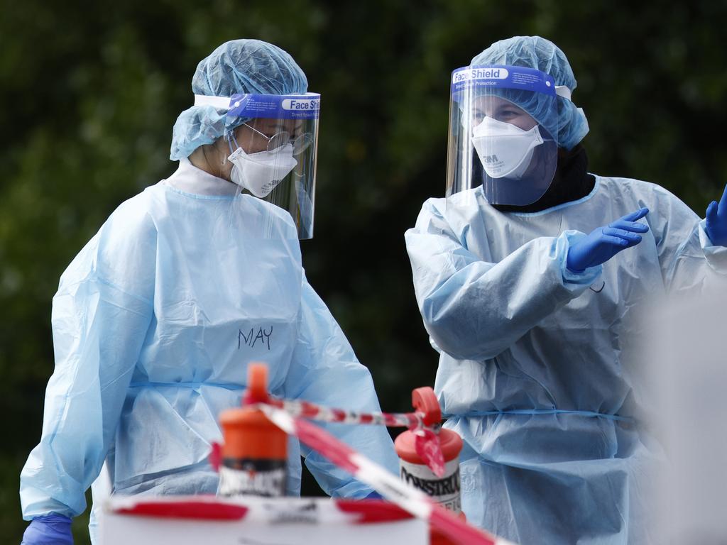 Health workers at a Covid testing centre in Melbourne. Picture: Daniel Pockett/NCA NewsWire