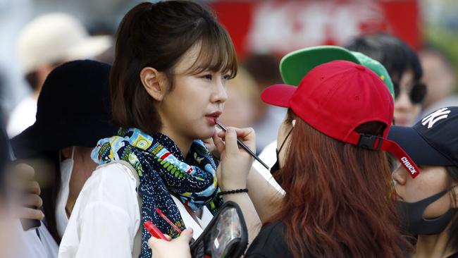 Go Won-hee getting a touch-up during the filming. Picture: Tertius Pickard