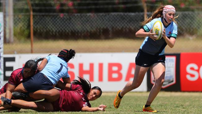 Zali O'Brien of NSW on the burst against Queensland.