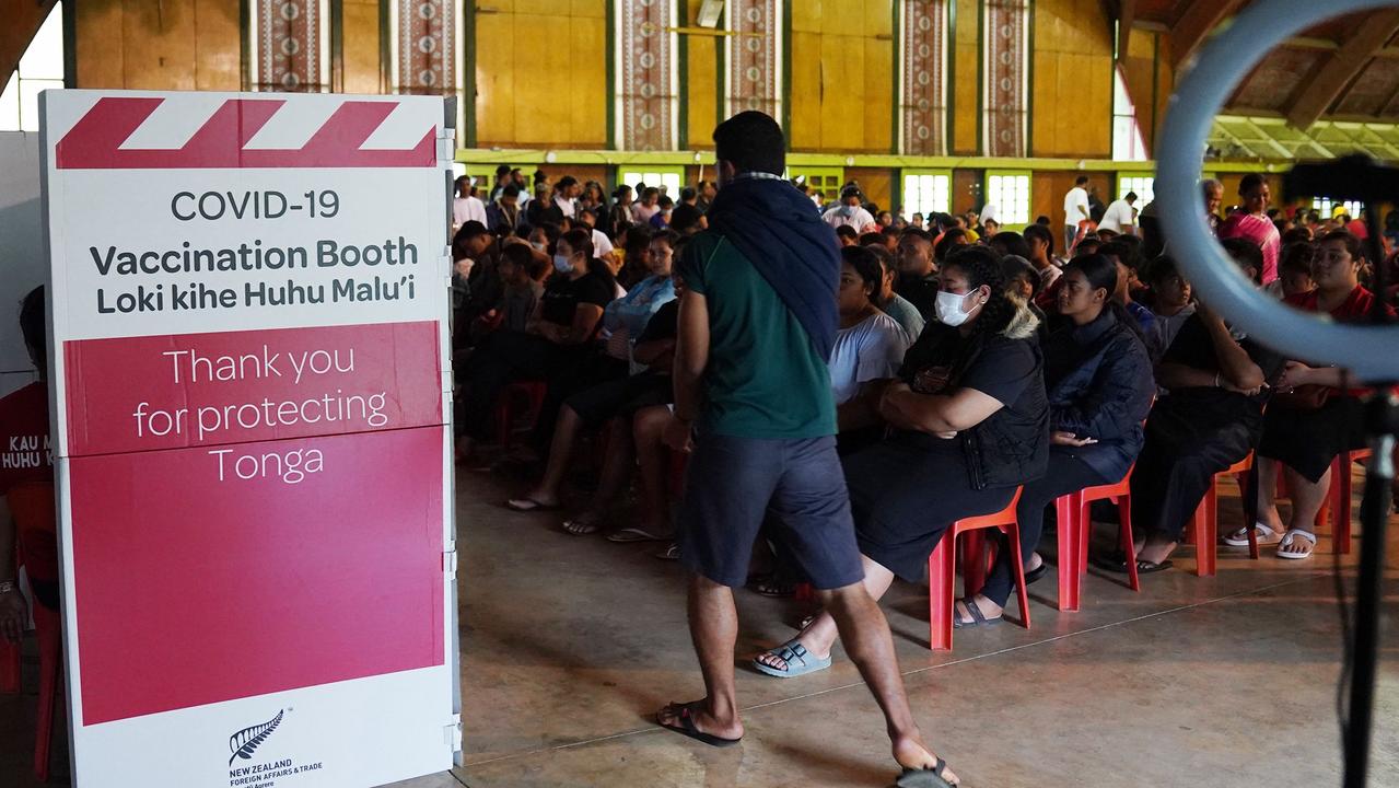 Masses have gathered in vaccination hubs in light of the new confirmed case. Picture: Eleanor Gee, Matangi Tonga, AFP.