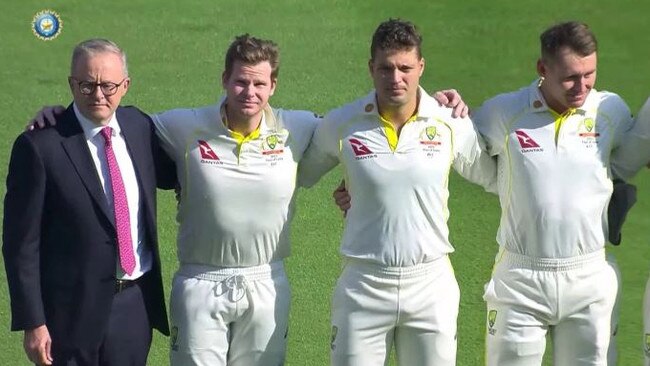 Prime Minister Anthony Albanese alongside Test captain Steve Smith for the Australian national anthem on Thursday in India. Picture: Kayo