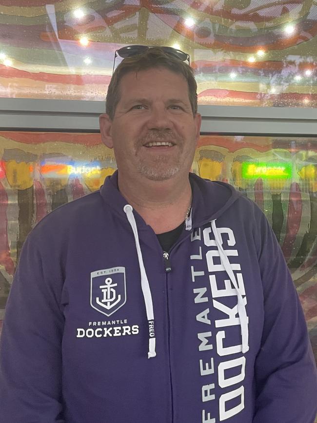 Dockers supporter Shannon Bell travelled all the way from Perth's eastern fringe to catch his team play the Demons at Traeger Park in Alice Springs on June 2, 2024. Fremantle Dockers, Melbourne Demons, Alice Springs.