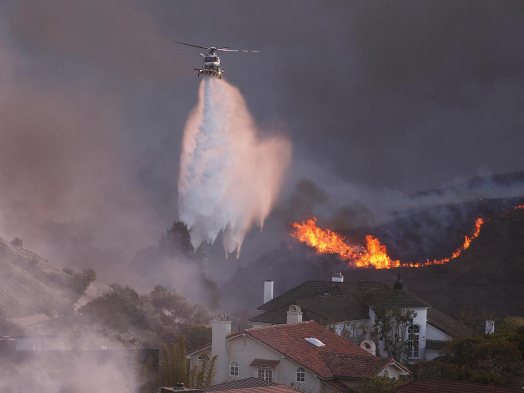 The fires span across 3,000 acres in Palisades, over 2,000 acres in Eaton, and around 500 acres in Hurst. (Photo by David Swanson / AFP)