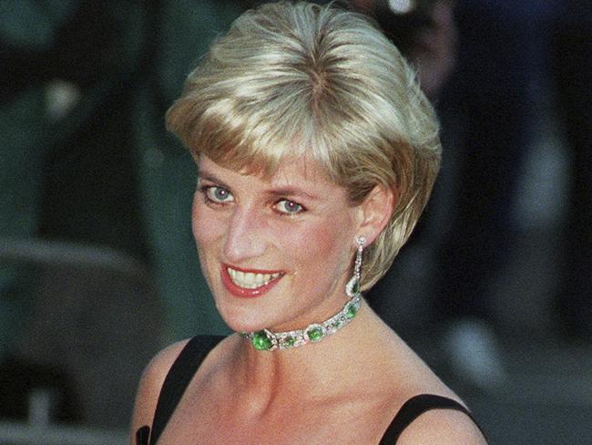 FILE â€“ In this July 1, 1997, file photo, Diana, Princess of Wales, smiles as she arrives at the Tate Gallery in London. The AP reported Friday, June 23, 2017, that a story renewing conspiracy theories that blame British agencies or the British royal family for the August 1997 death of Diana and boyfriend Dodi Al-Fayed in Paris are false. (AP Photo/Jacqueline Arzt Larma, File)