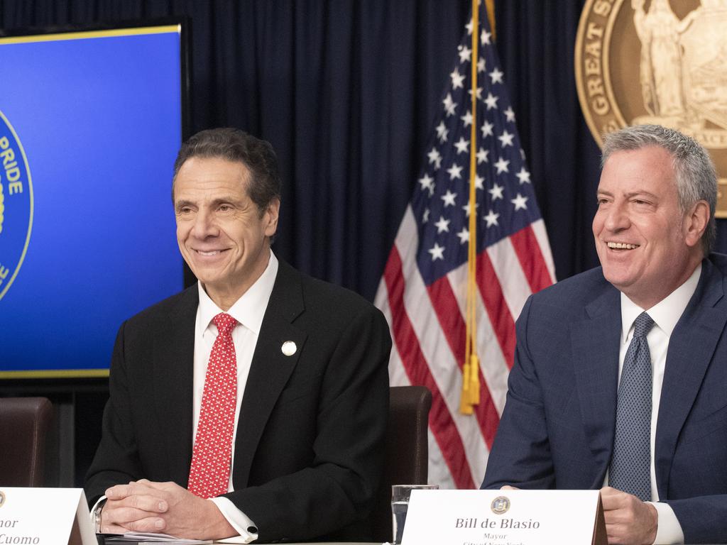 Andrew Cuomo, left, and New York Mayor Bill de Blasio have led New York’s virus response. The state has been hit worse than many countries, with more than 10,000 deaths. Picture: Photo/Mark Lennihan.