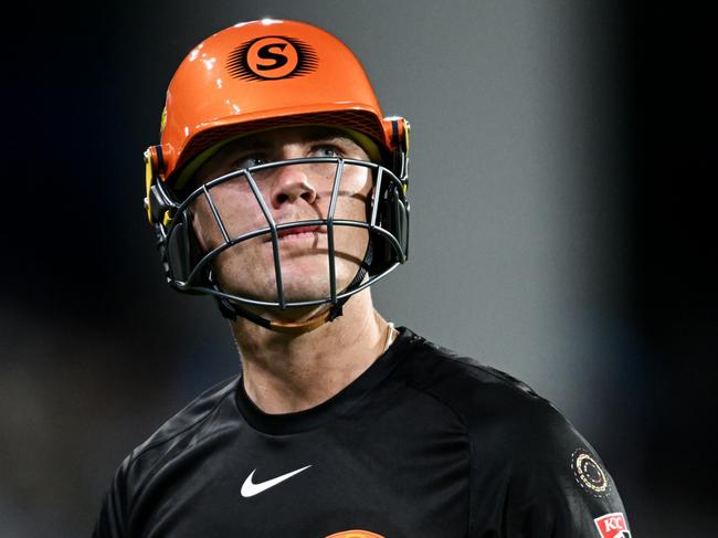 ADELAIDE, AUSTRALIA - DECEMBER 31: Finn Allen of the Scorchers leaves the ground after getting out to Brendan Doggett of the Strikers during the BBL match between Adelaide Strikers and Perth Scorchers at Adelaide Oval, on December 31, 2024, in Adelaide, Australia. (Photo by Mark Brake/Getty Images)