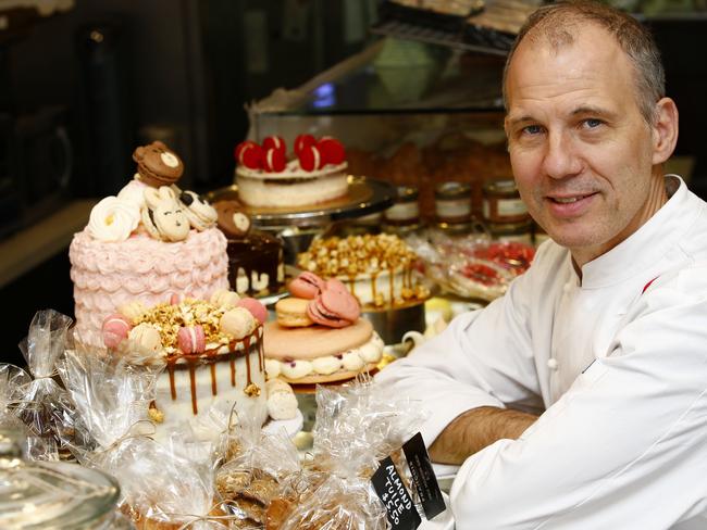 Pastry Chef Francois Galand among sweet treats at his shop. Picture: John Appleyard