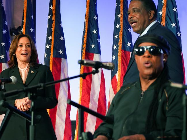 Kamala Harris watches as Stevie Wonder performs at a campaign event at Divine Faith Ministries International in Jonesboro, Georgia. Picture: Getty Images