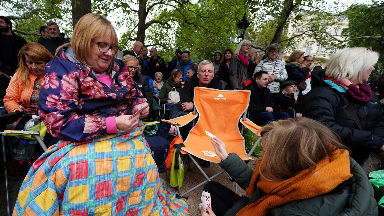 With chairs, sleeping bags and blankets they lined the procession route. Picture: Martin Rickett – WPA Pool/Getty Images