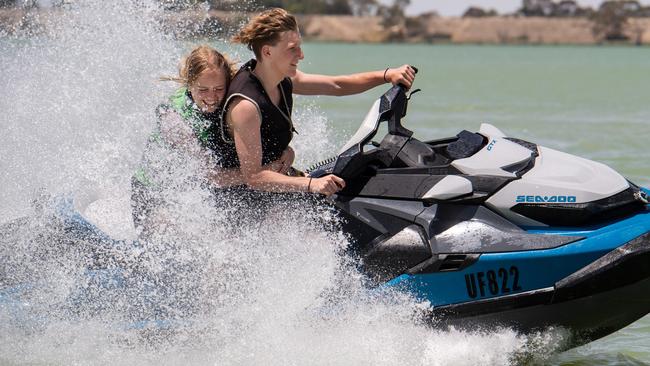 Lachy (16) and Scarlett (15) have fun at Lake Charm. Picture Jay Town