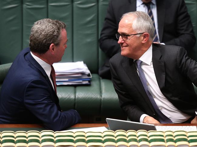 Malcolm Turnbull, pictured with Christopher Pyne, believes our emissions, particularly from coal-fired power stations, heat the world dangerously and must be cut. Picture: Kym Smith