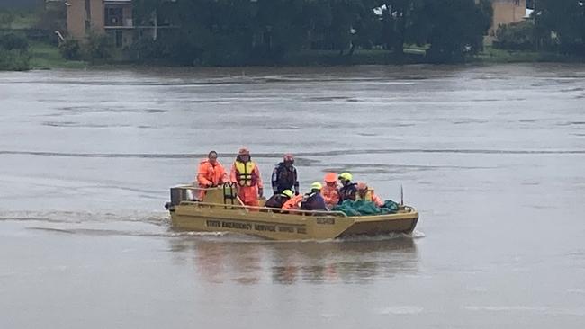 The dramatic rescue of a woman believed to be in her 80s, rescued form flood waters near Kempsey.