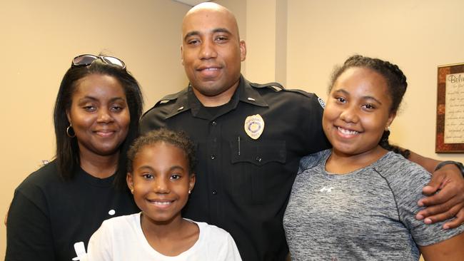 Alfred Cooper’s wife Dashanka and their two daughters pray he’ll come home safe each day. Picture: Gary Ramage