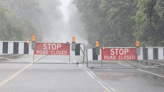 The Wakehurst Parkway was closed again this week after torrential weekend rain sent floodwaters across the two-way arterial road. Picture: Damian Shaw