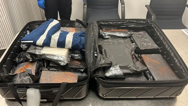 A man has been charged after he allegedly tried to smuggle 25kg of coke into Melbourne. Picture: AFP