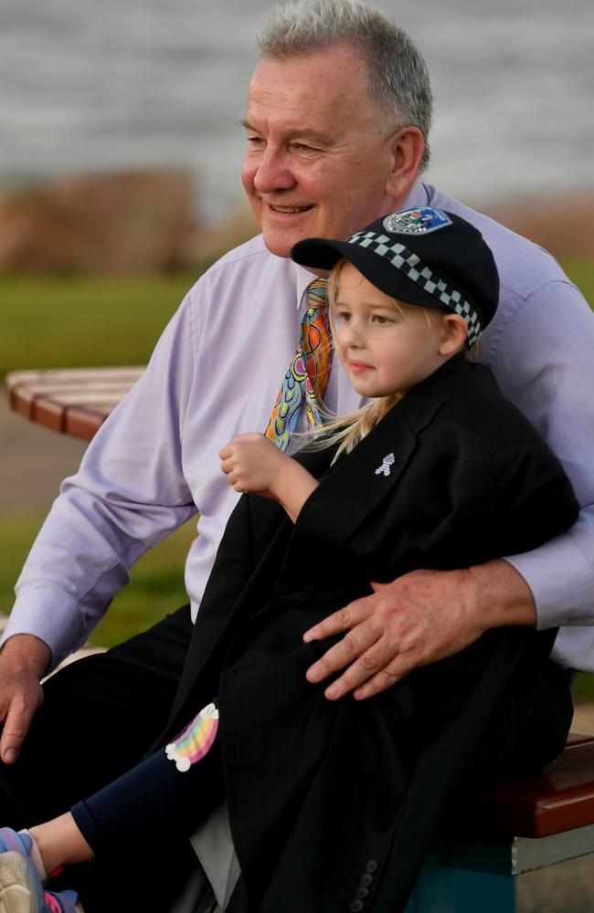 National Police Remembrance Candlelight Vigil 2023 at the Rockpool, Townsville. Regional Executive Director Child Safety David Tucker with granddaughter Natasha, 4. Picture: Evan Morgan