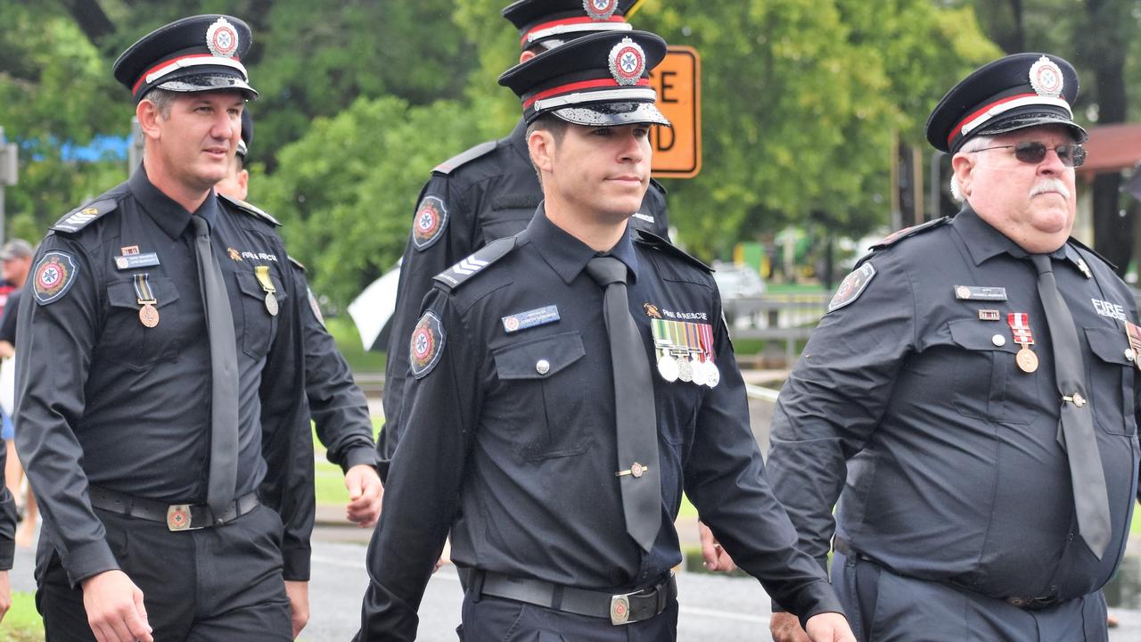 Mr Giudicatti, pictured left during an Anzac Parade in Ingham in 2022, will be able to add the Bravery Medal to the growing collection on his dress uniform. Picture: Cameron Bates