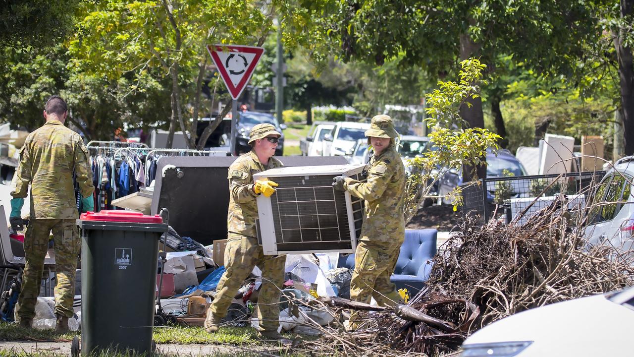 Australian Army soldiers from 2nd/14th Light Horse Regiment (Queensland Mounted Infantry) assist the local community of Gatton, Queensland with removing flood-damaged belongings, as part of Operation Flood Assist 2022.