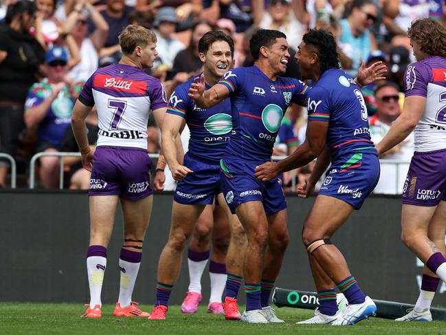 HAMILTON, NEW ZEALAND - FEBRUARY 15: Taine Tuaupiki of the Warriors celebrates his try (C) during the 2025 NRL Pre-Season Challenge match between New Zealand Warriors and Melbourne Storm at FMG Stadium Waikato on February 15, 2025 in Hamilton, New Zealand. (Photo by Fiona Goodall/Getty Images)