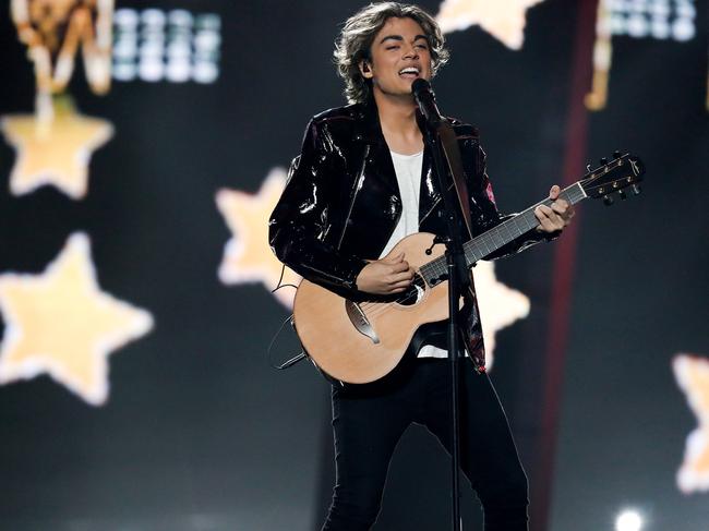 19-year-old singer-songwriter Jordan-Ravi performs Pushing Stars during the 2020 Eurovision – Australia Decides final at the Gold Coast Convention and Exhibition Centre on the Gold Coast, Saturday, February 8, 2020. (AAP Image/Regi Varghese)