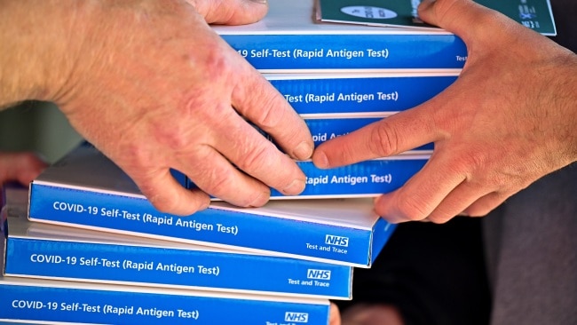The federal government will allow Australians to test themselves for coronavirus at home from November 1. COVID-19 Rapid Antigen test kits are handed out to members of the public in Scotland. Picture: Getty Images