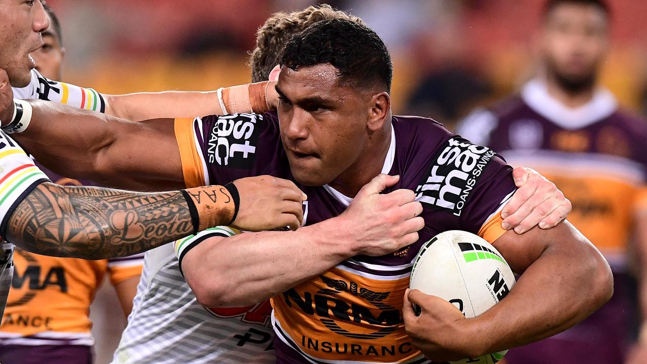 BRISBANE, AUSTRALIA - AUGUST 16: Tevita Pangai of the Broncos takes on the defence during the round 22 NRL match between the Brisbane Broncos and the Penrith Panthers at Suncorp Stadium on August 16, 2019 in Brisbane, Australia. (Photo by Bradley Kanaris/Getty Images)