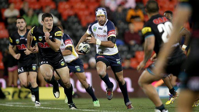 Johnathan Thurston makes a break for the Cowboys. Picture: Gregg Porteous