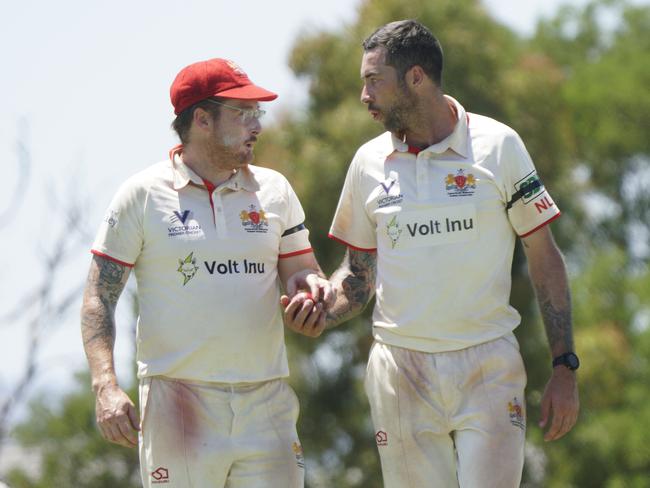 Casey bowler Nathan Lambden and his captain Luke Shelton talk tactics. The pair fronted the CV tribunal on Tuesday. Picture: Valeriu Campan